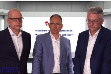 Ernste Mienen bei den drei ArGeZ-Vertretern: Christian Vietmeyer, Michael Weigelt und Dr. Martin Theuringer (v.r.n.l.; Screenshot: KI)